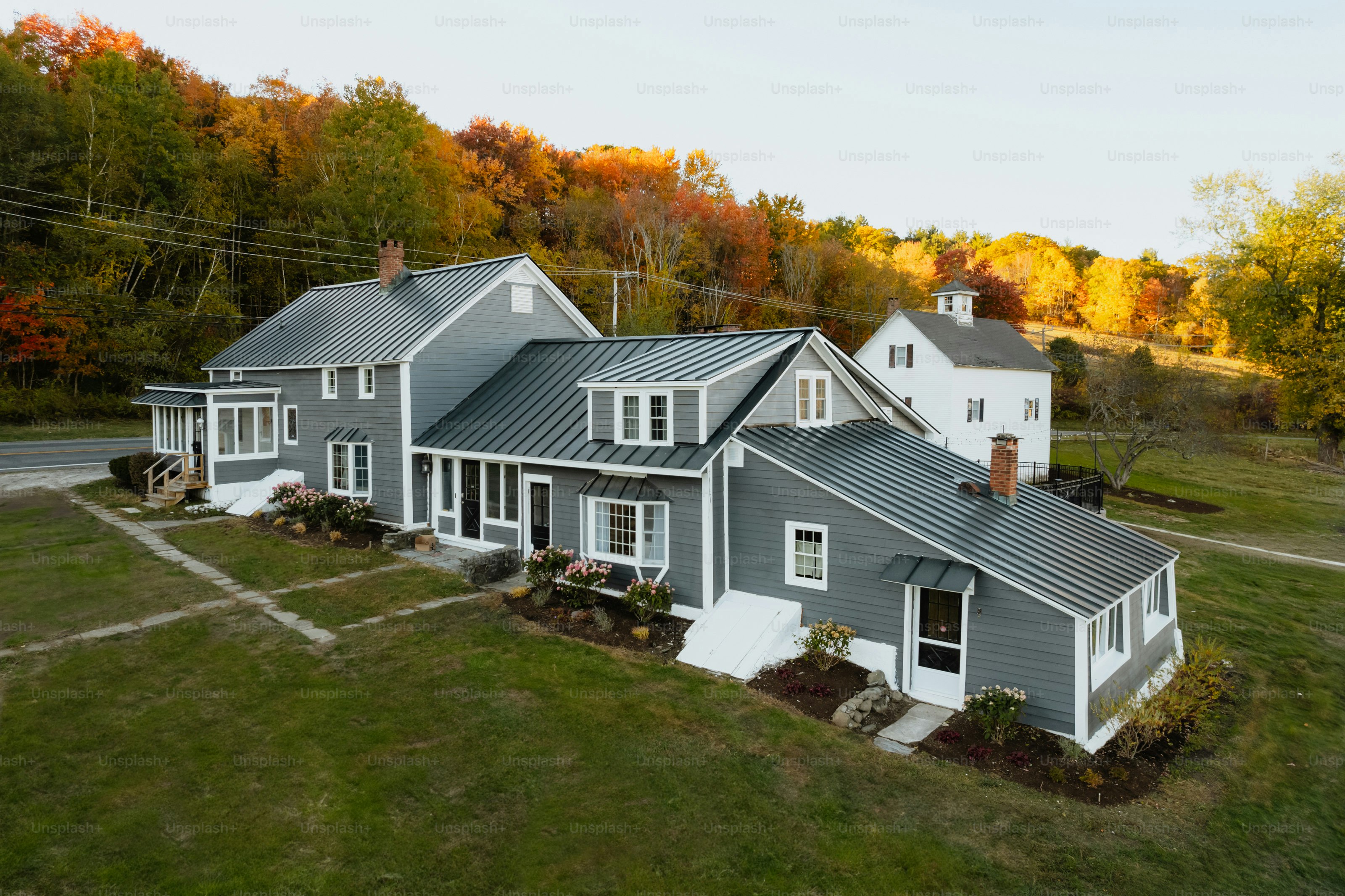 An aerial view of a house in the fall